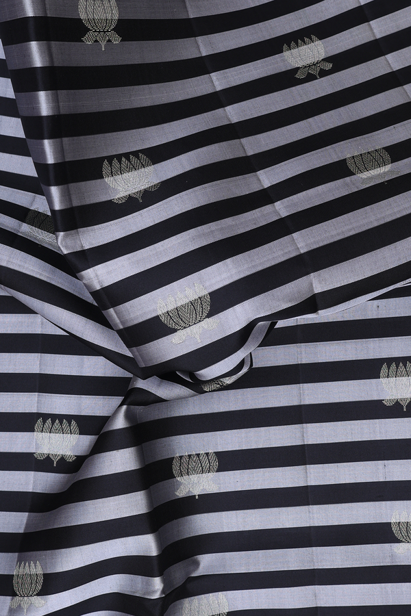 Soft Silk Saree In Black And Grey Along Stripes With Buttas
