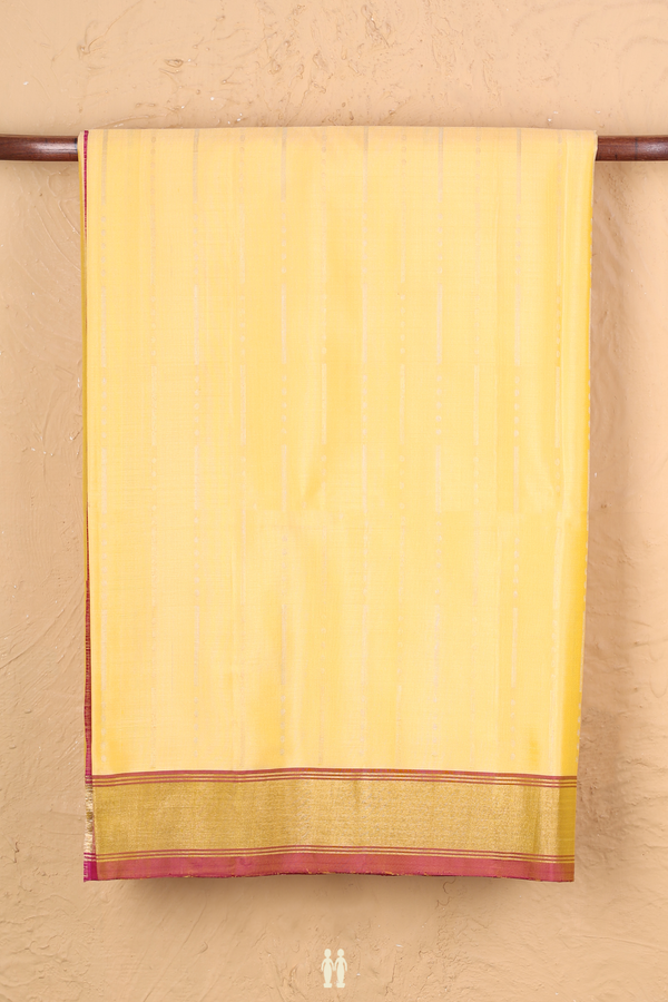 Soft Silk Saree In Pale Yellow With Stripes Design