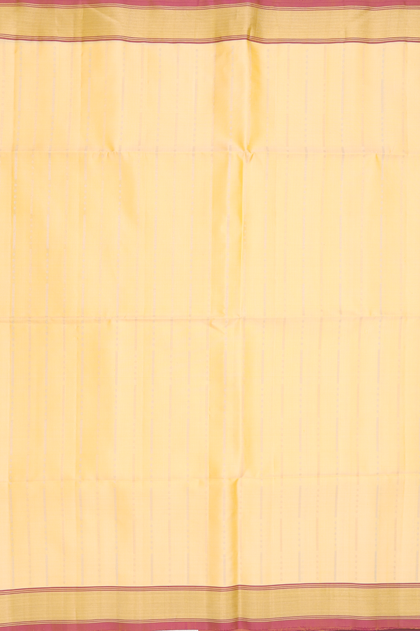 Soft Silk Saree In Pale Yellow With Stripes Design