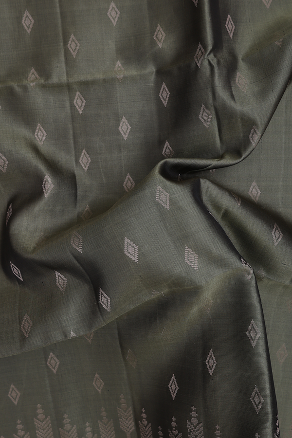 Soft Silk Saree In Chalet Green With Diamond Buttas