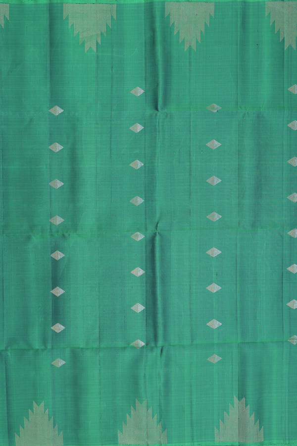 Soft Silk Saree In Green With Diamond Buttas