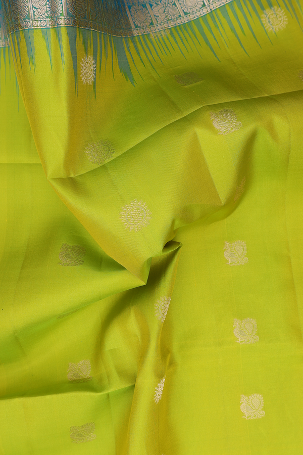 Soft Silk Saree In Lime Green With Peacock Buttas