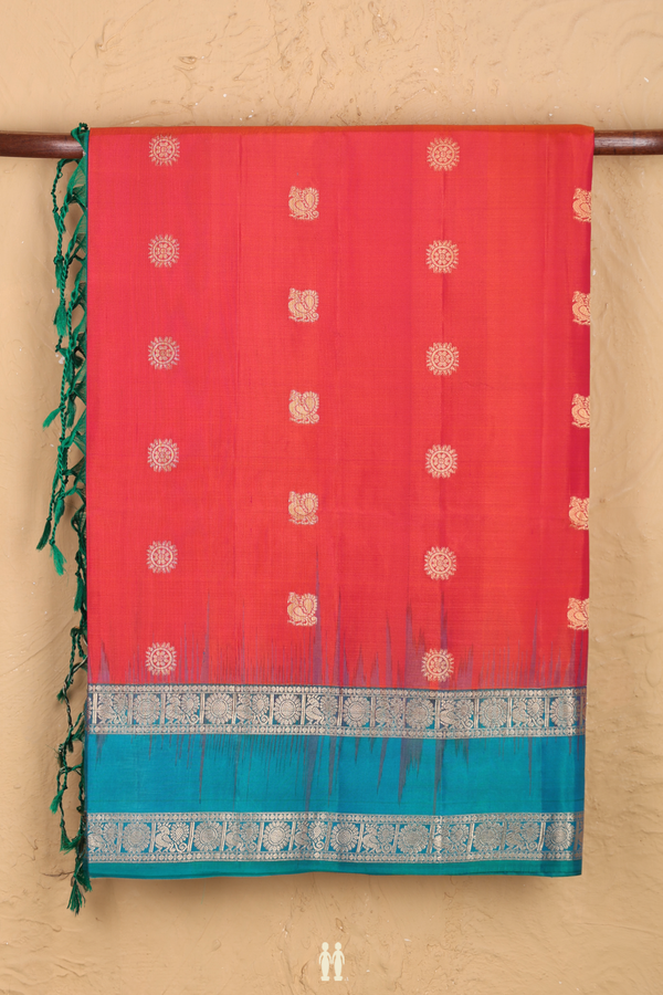 Soft Silk Saree In Coral Pink With Peacock Buttas