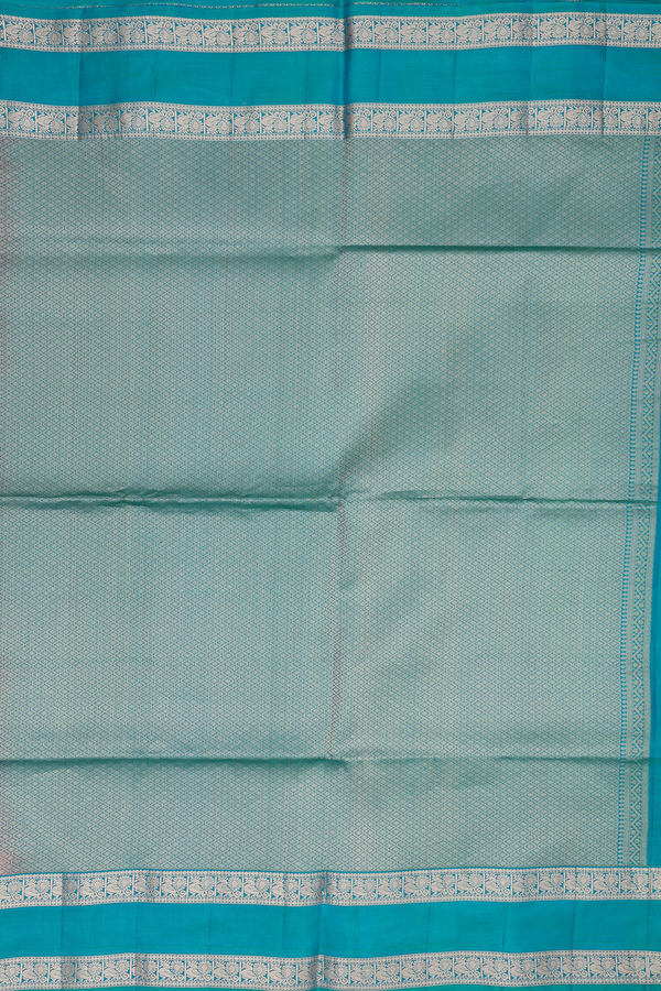 Soft Silk Saree In Coral Pink With Peacock Buttas