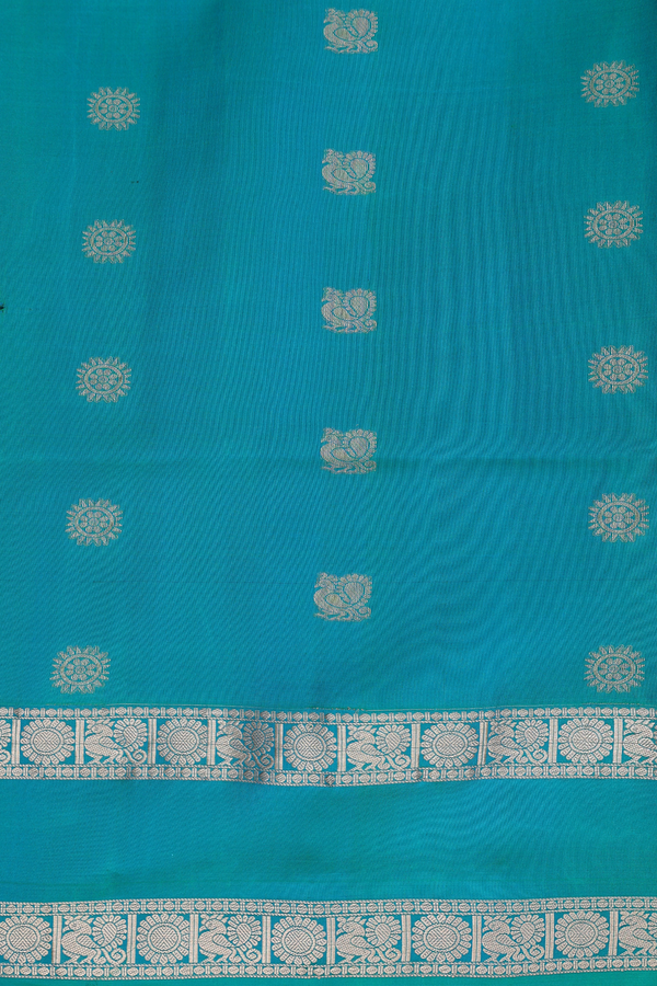 Soft Silk Saree In Coral Pink With Peacock Buttas