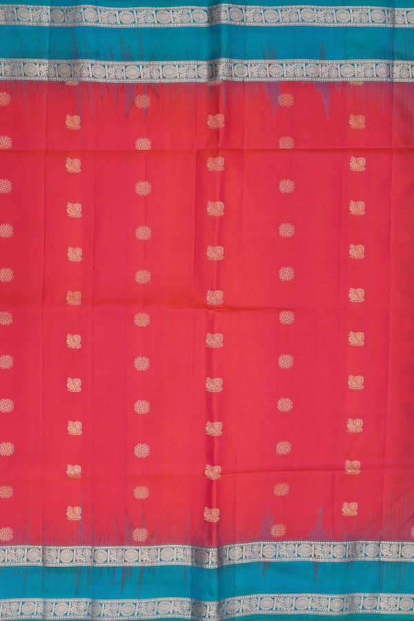 Soft Silk Saree In Coral Pink With Peacock Buttas