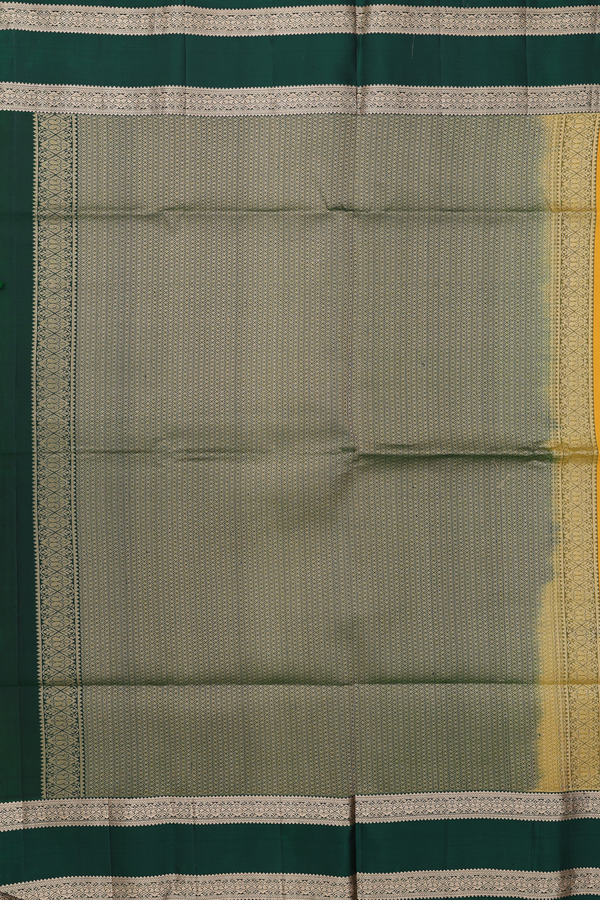 Soft Silk Saree In Saffron Yellow With Floral Buttas
