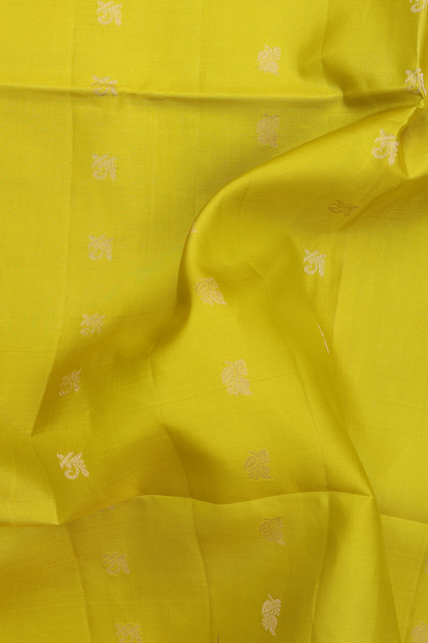 Soft Silk Saree In Olive Yellow With Leaf Buttas