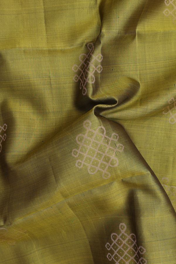 Soft Silk Saree In Olive Green With Kolam Buttas