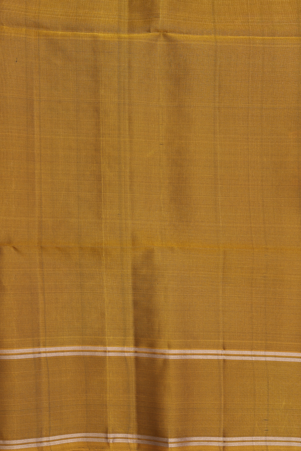 Soft Silk Saree In Green With Zari Buttas