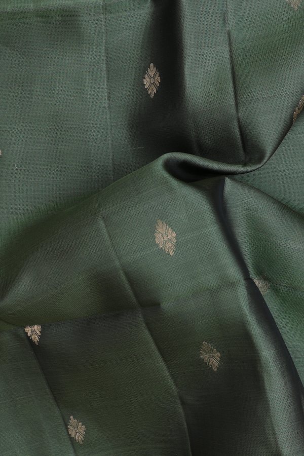 Soft Silk Saree In Green With Zari Buttas
