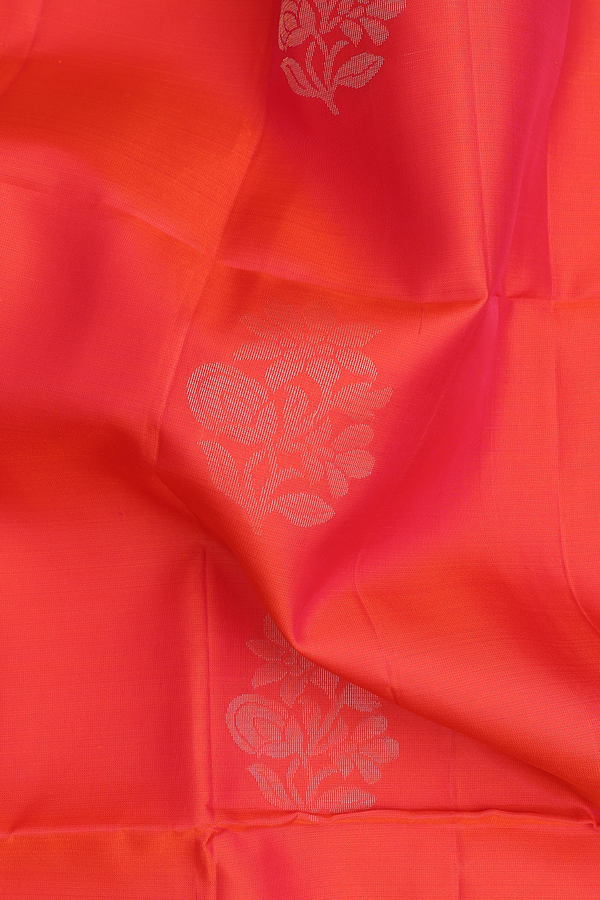 Soft Silk Saree In Coral Orange With Floral Motifs