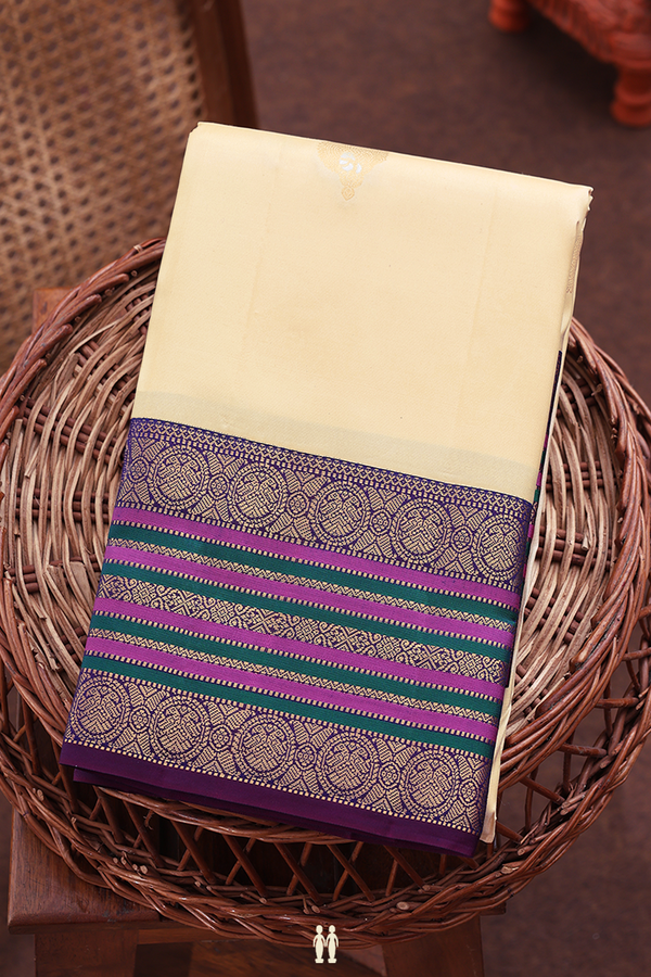Kanchipuram Silk Saree In Cream Color With Zari Buttas