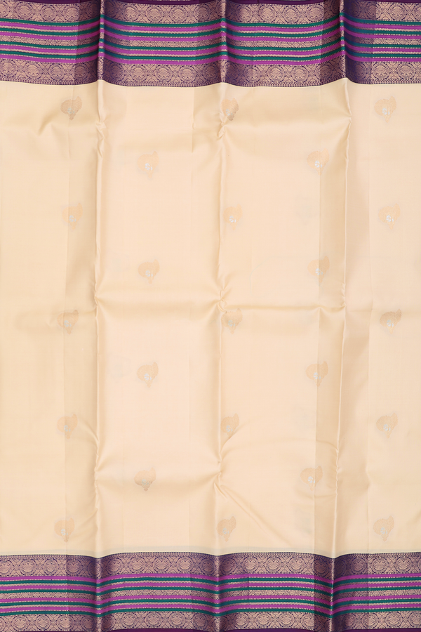 Kanchipuram Silk Saree In Cream Color With Zari Buttas