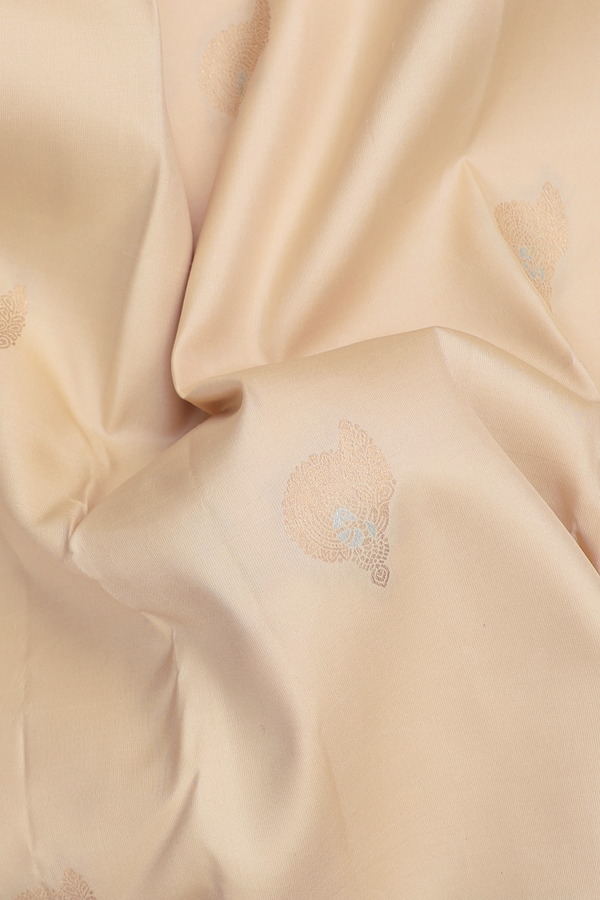 Kanchipuram Silk Saree In Cream Color With Zari Buttas