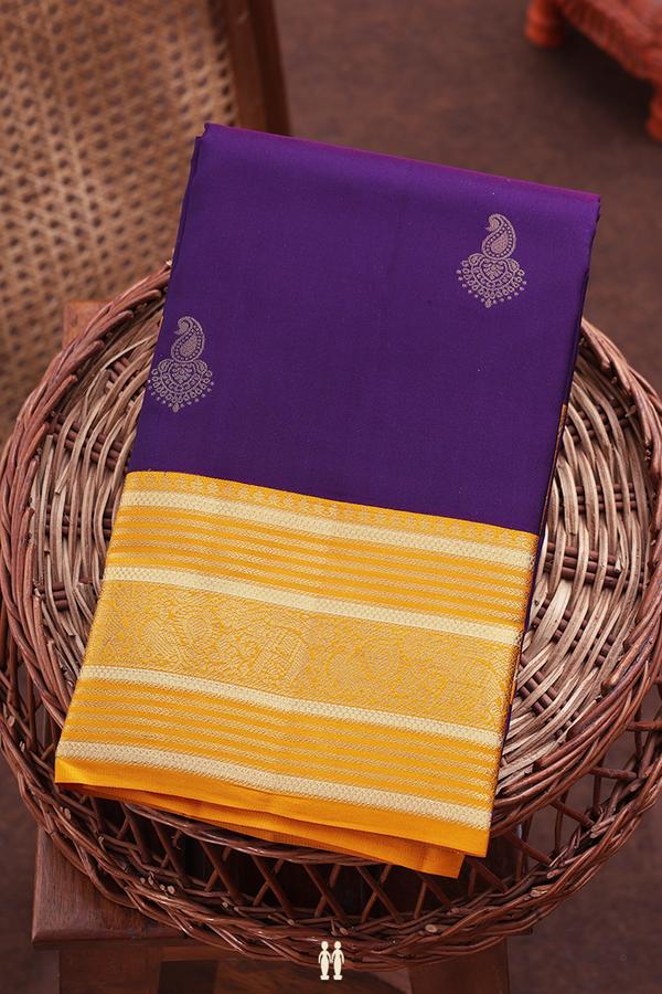 Kanchipuram Silk Saree In Regal Purple With Paisley Buttas