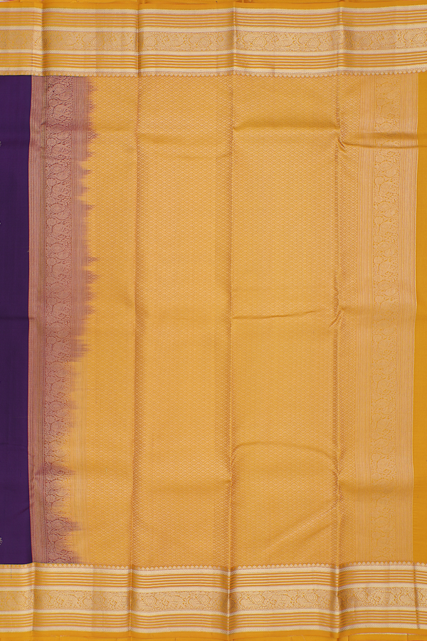 Kanchipuram Silk Saree In Regal Purple With Paisley Buttas