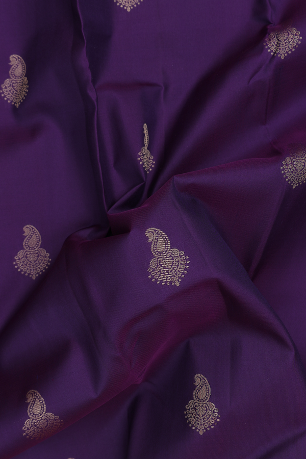 Kanchipuram Silk Saree In Regal Purple With Paisley Buttas