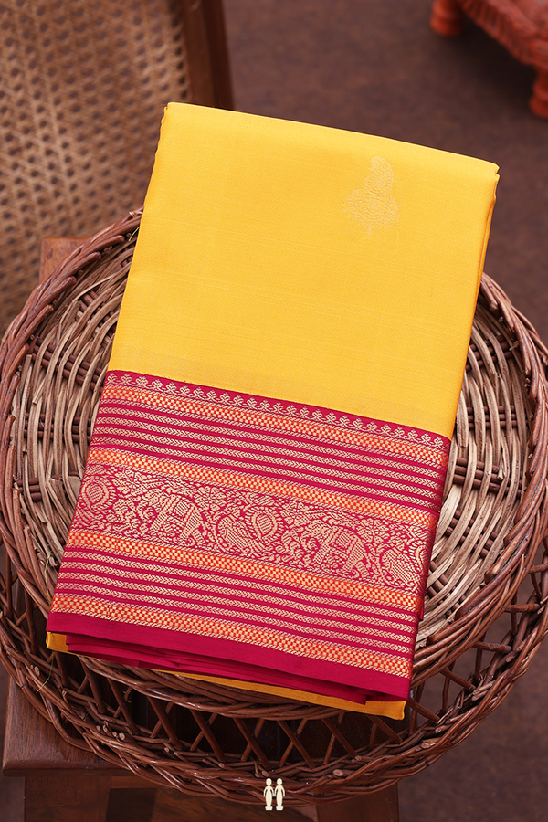 Kanchipuram Silk Saree In Yellow With Paisley Buttas