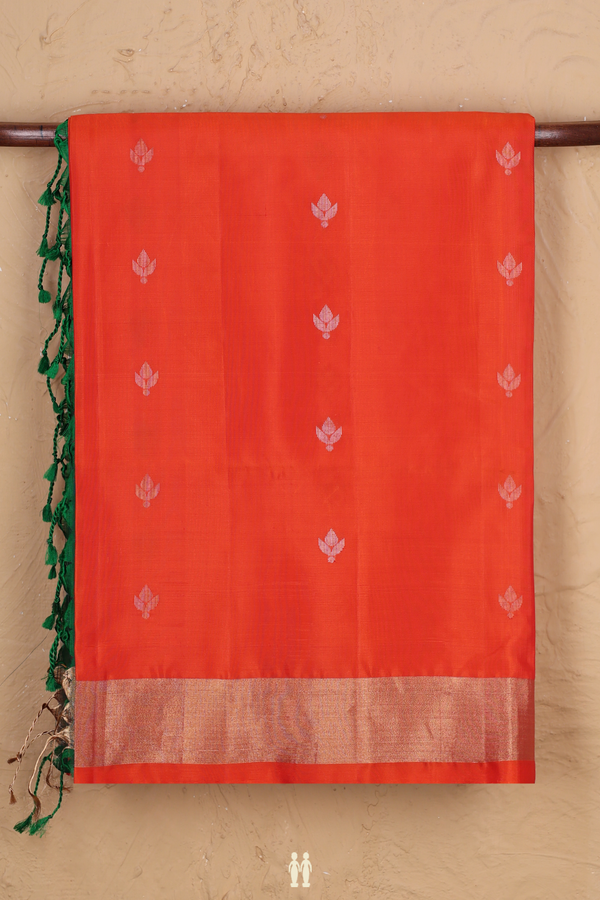 Soft Silk Saree In Bright Orange With Floral Buttas