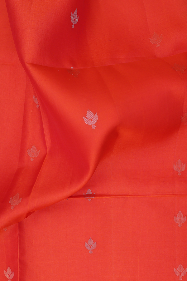 Soft Silk Saree In Bright Orange With Floral Buttas