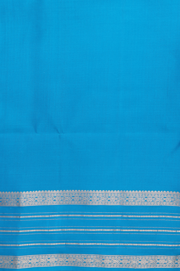 Soft Silk Saree In Purple With Zari Buttas