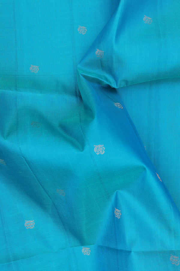 Soft Silk Saree In Blue With Floral Buttas