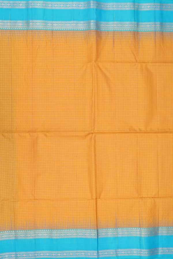 Soft Silk Saree In Saffron Yellow With Checks Design