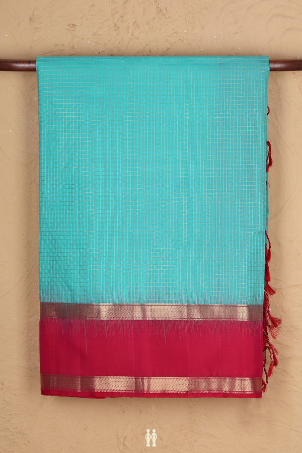Soft Silk Saree In Tiffany Blue With Checks Design