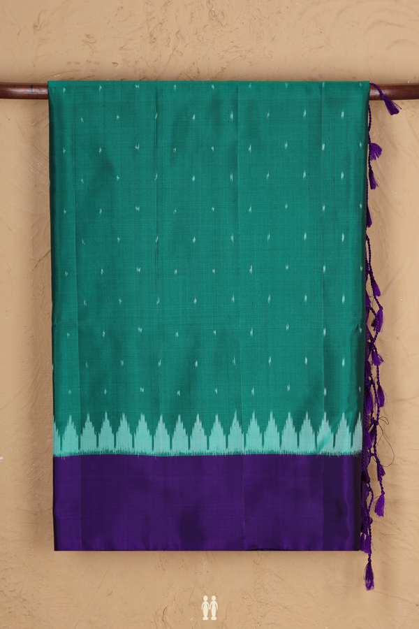 Soft Silk Saree In Emerald Green With Ikat Buttis