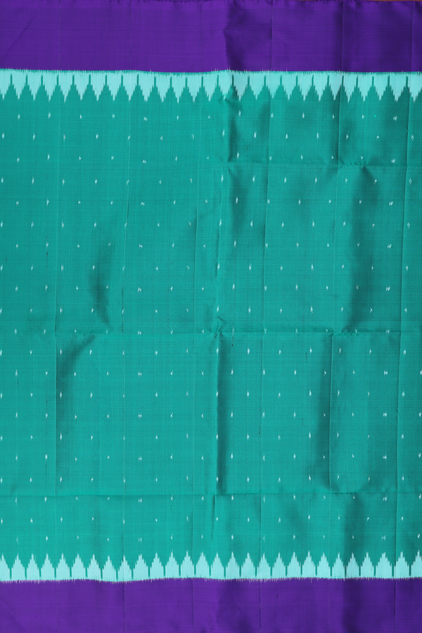 Soft Silk Saree In Emerald Green With Ikat Buttis