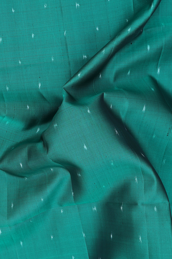 Soft Silk Saree In Emerald Green With Ikat Buttis