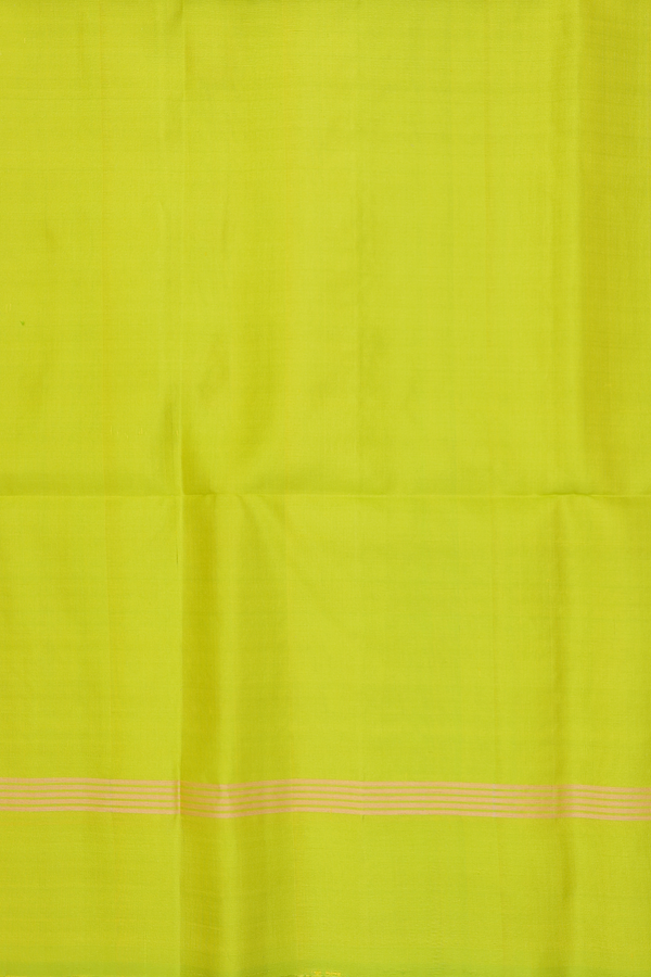 Soft Silk Saree In Lime Green With Zari Buttas