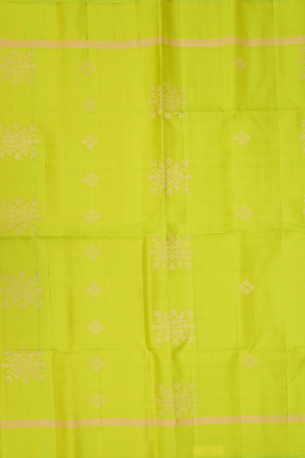Soft Silk Saree In Lime Green With Zari Buttas