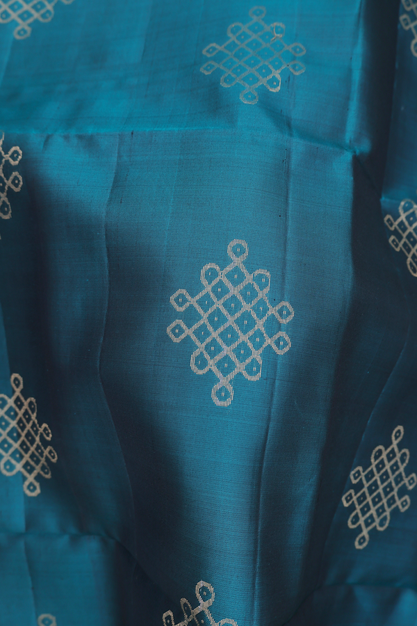 Soft Silk Saree In Teal Green With Kolam Buttas