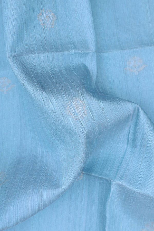 Raw Silk Saree In Blue With Floral Buttas