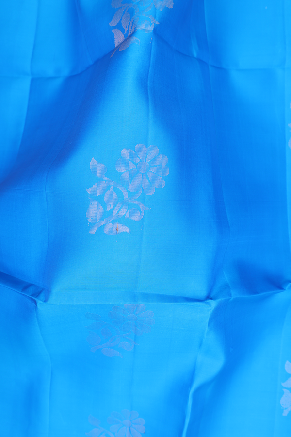 Soft Silk Saree In Deep Sky Blue With Floral Motifs