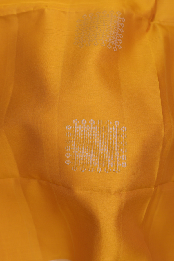 Soft Silk Saree In Marigold Yellow With Kolam Motifs