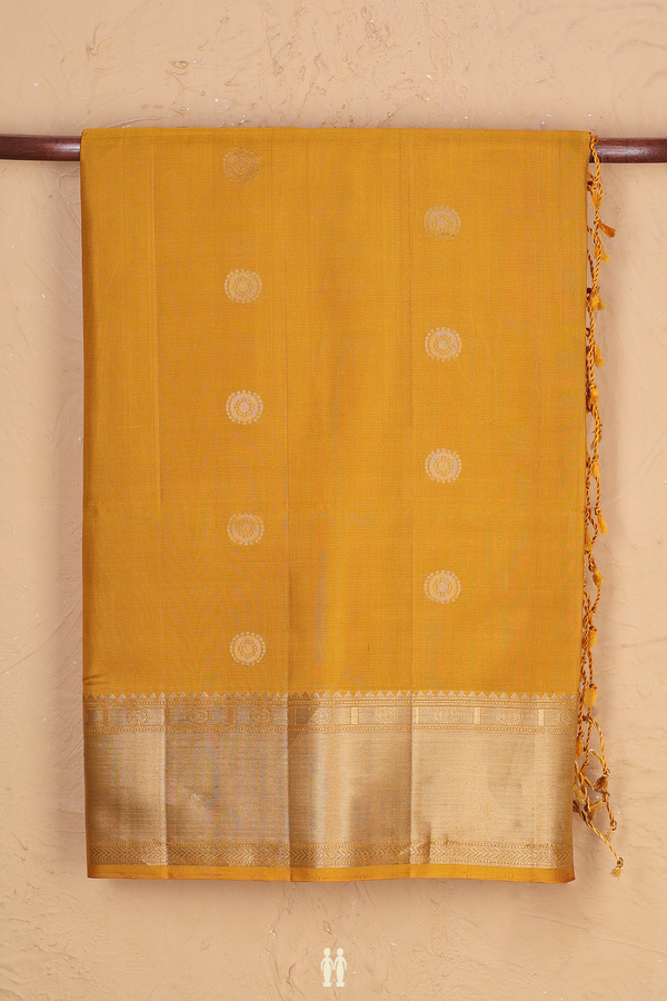 Soft Silk Saree In Yellow With Chakram Buttas