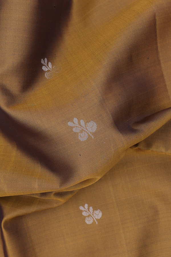 Soft Silk Saree In Golden Brown With Zari Buttas