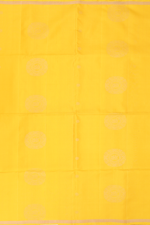 Soft Silk Saree In Yellow With Zari Motifs