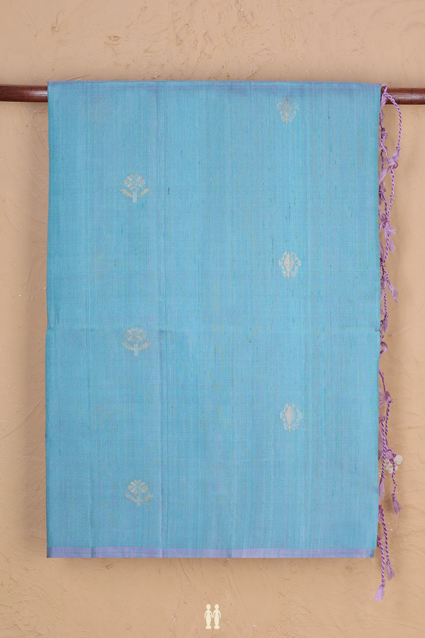 Raw Silk Saree In Blue With Floral Buttas