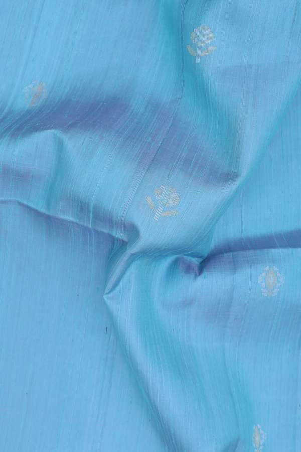 Raw Silk Saree In Blue With Floral Buttas
