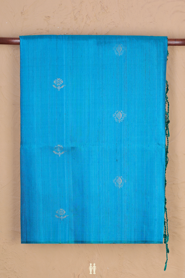 Raw Silk Saree In Cerulean Blue With Floral Buttas