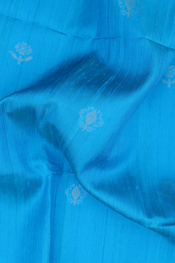 Raw Silk Saree In Cerulean Blue With Floral Buttas