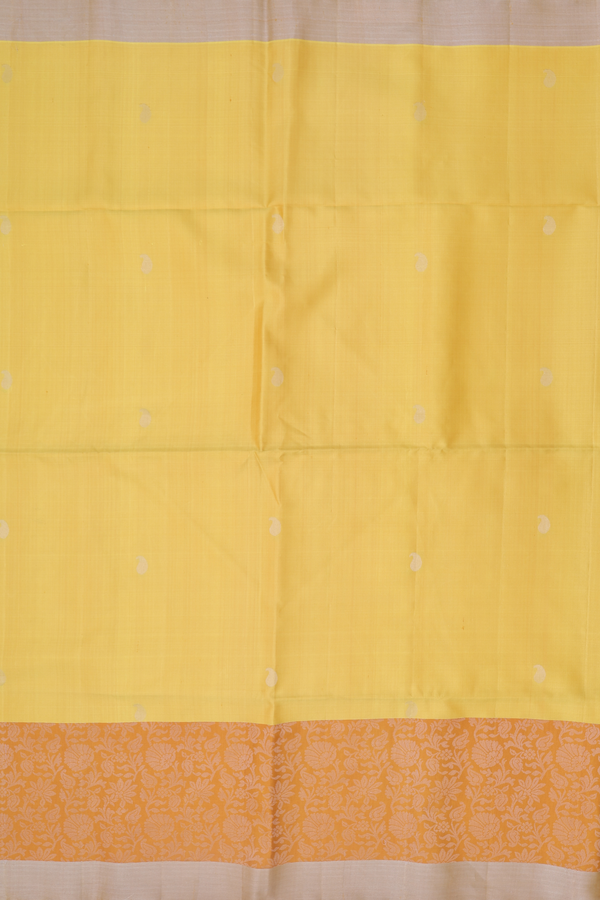 Soft Silk Saree In Yellow With Paisley Buttas