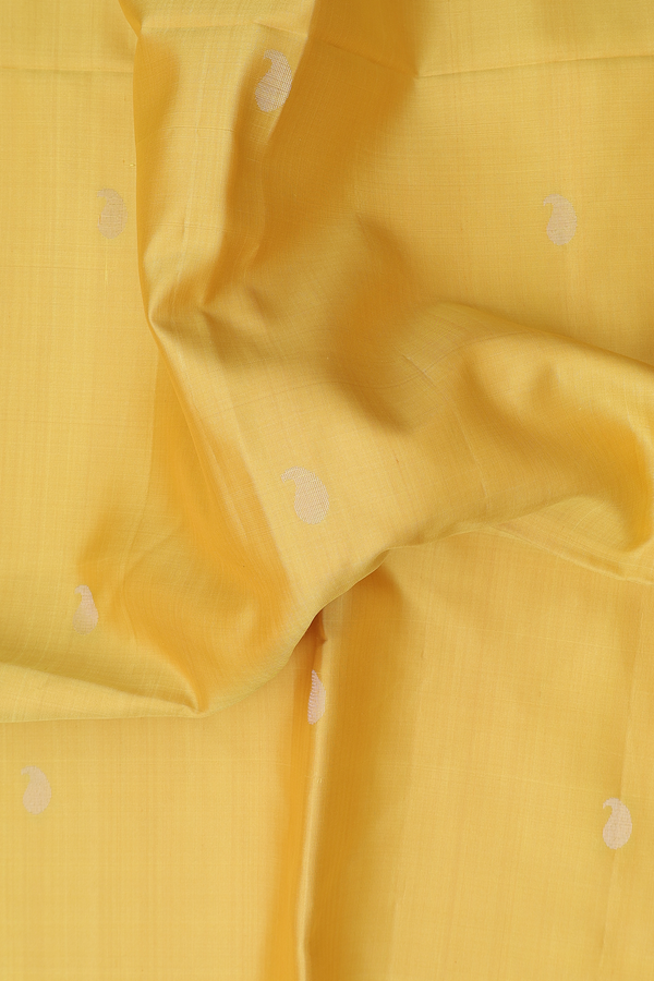Soft Silk Saree In Yellow With Paisley Buttas