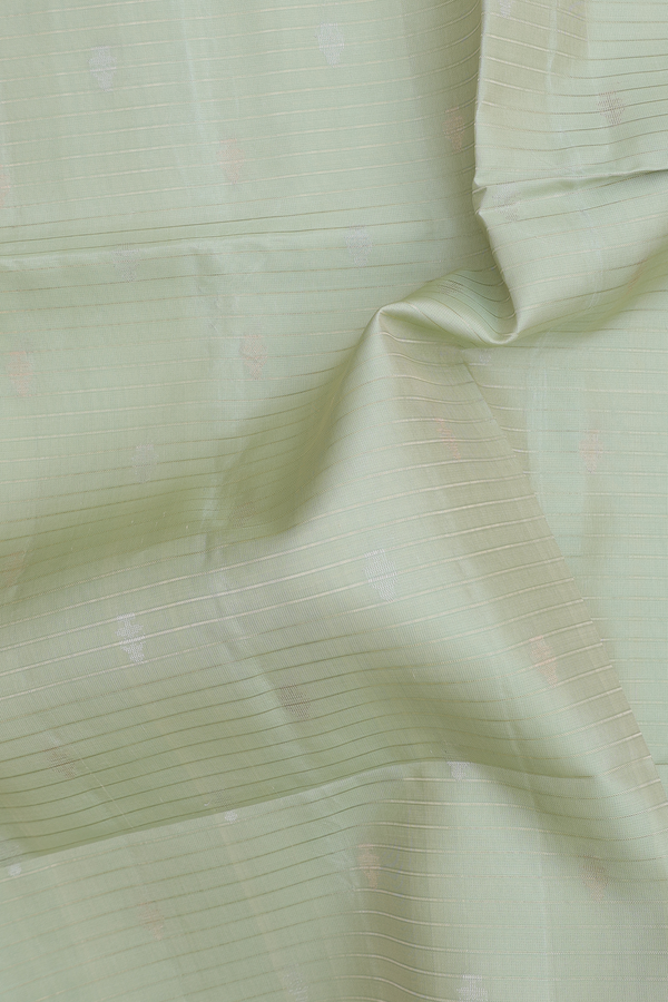 Soft Silk Saree In Light Green With Stripes Design