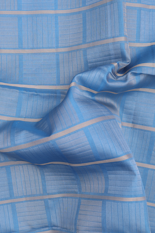 Soft Silk Saree In Light Blue With Checks Design