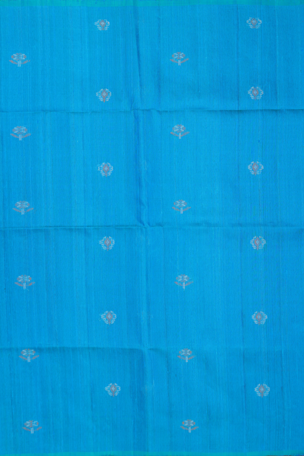 Raw Silk Saree In Blue With Floral Buttas